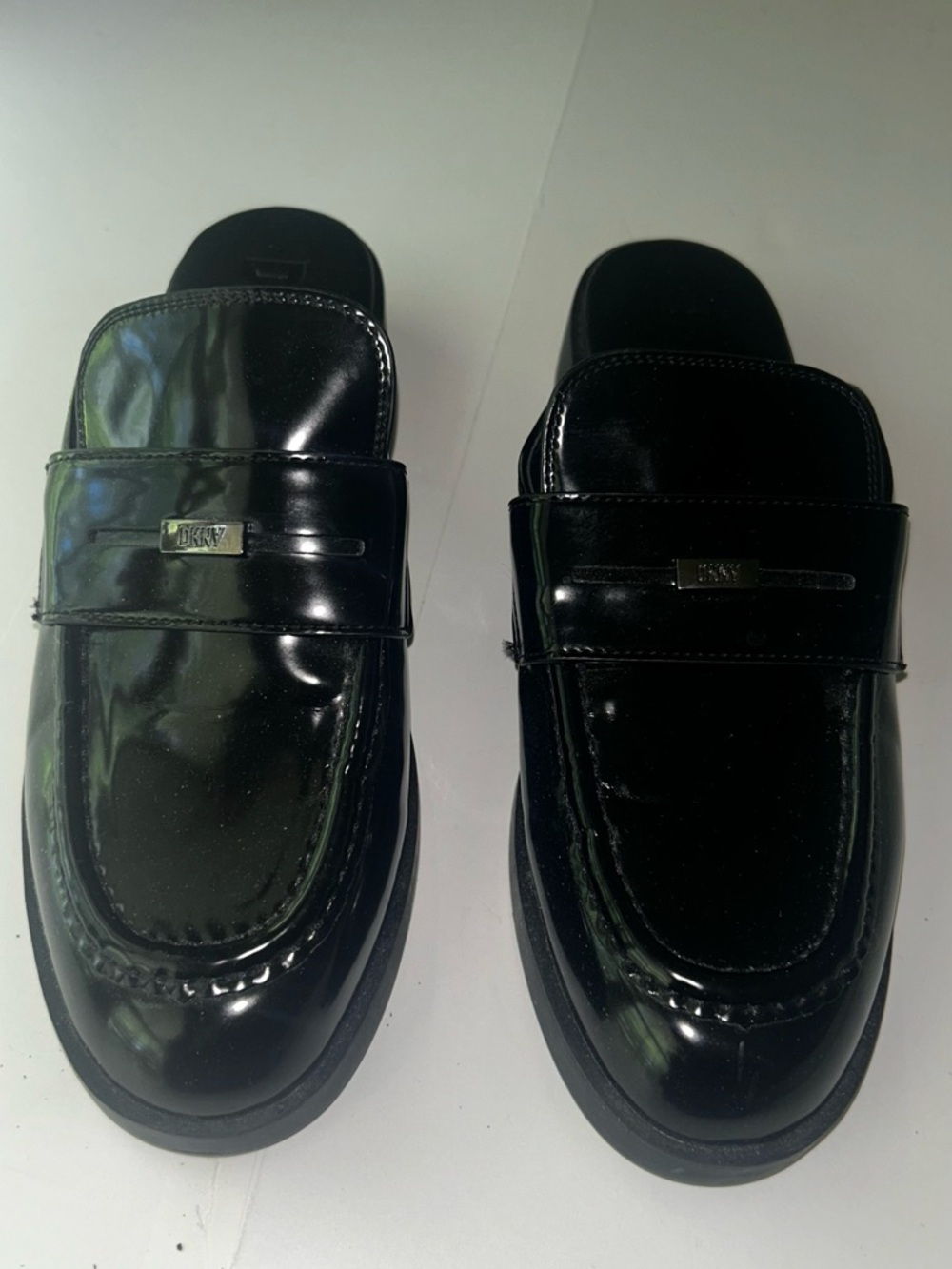 DKNY Black Patent Leather Slip-On Loafers with Metal Logo